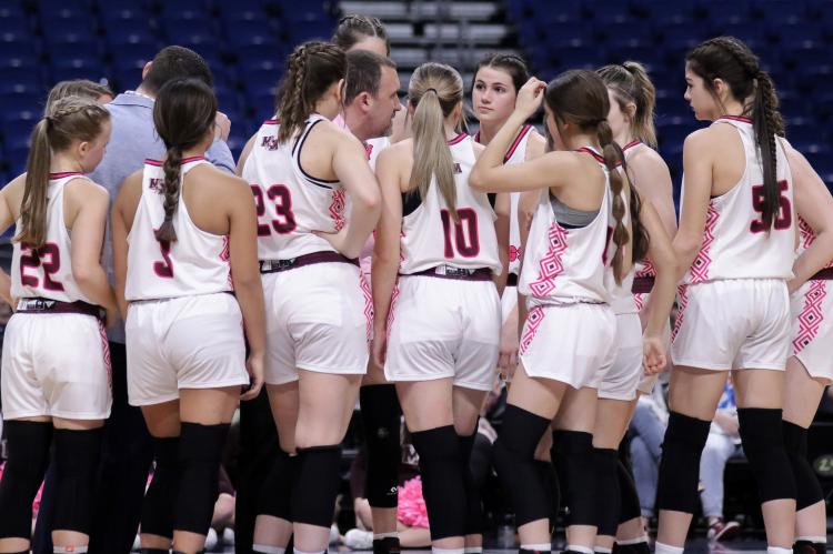 Martins Mill Lady Mustang Head Coach Jay Bruce discusses offensive and defensive strategies March 2 during the Class 2A State Championship game against Nocona.